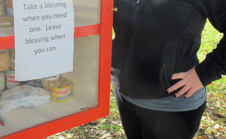 Maggie Ballard of Wichita, Kan., and her "blessing box" filled with food and personal care items that she and others have donated.
