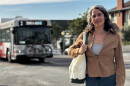 Monica De La Cruz stands in Golden Hill as an MTS bus passes behind her, March 2, 2026.