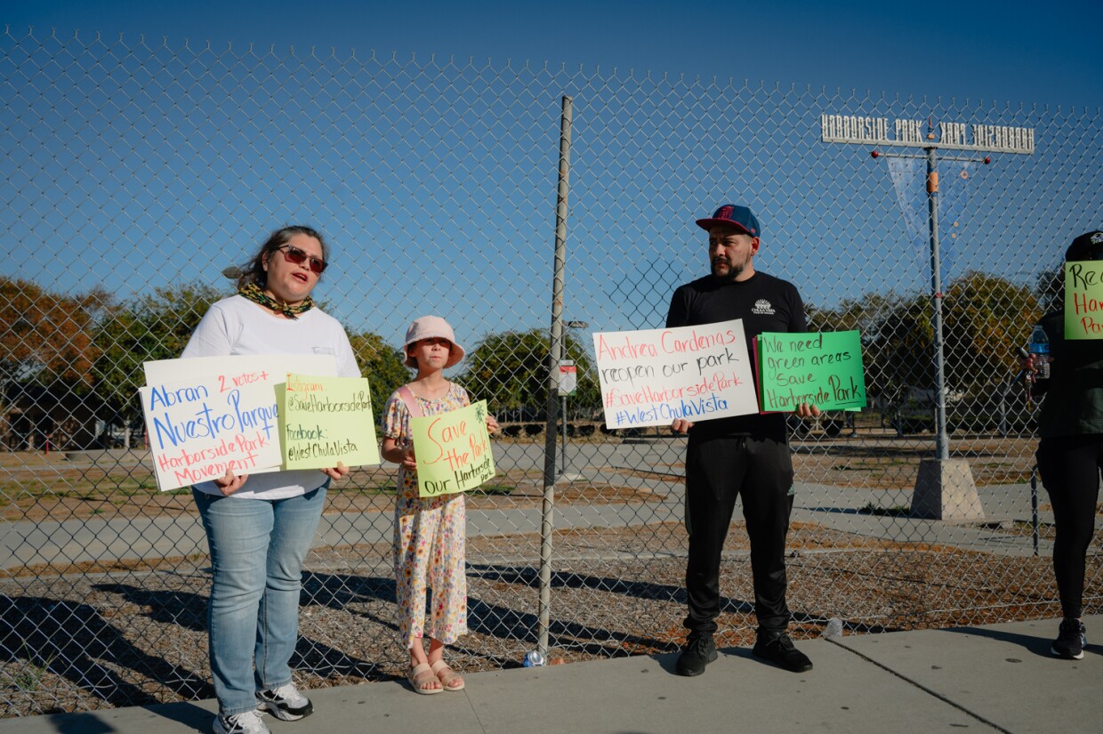 Organizer Leticia Lares, left, speaks during a rally in support of reopening Harborside Park in front of the park in Chula Vista on Nov. 4, 2023.