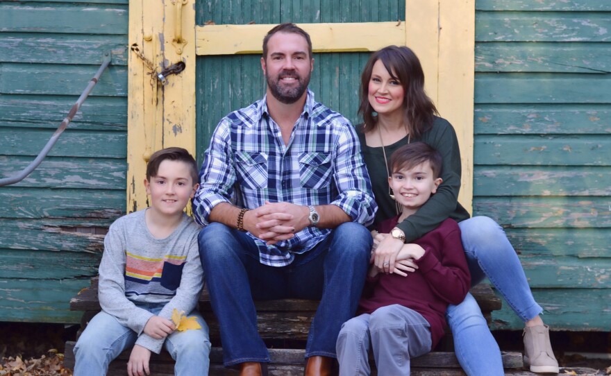 Brittany Schwaigert with her husband, Ryan, 13-year-old Greyson (far right) and 10-year-old Lachlan. Schwaigert is a lead plaintiff in a class action lawsuit challenging the Tennessee governor's opt-out policy on masks.