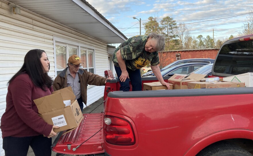 Cheri Goodwin and former miners load up supplies from the union's pantry to bring to the United Mine Workers of America rally.
