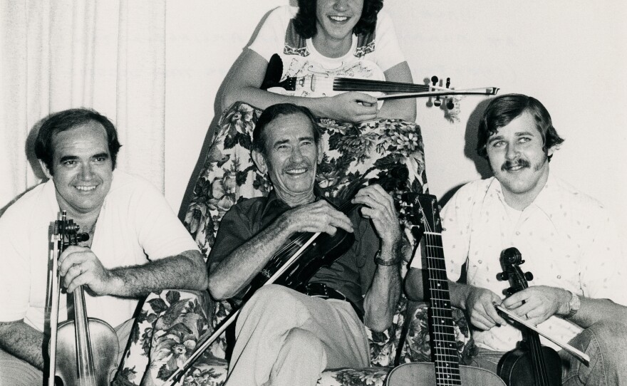 A 14-year-old O'Connor (top) poses with fellow world champion fiddlers (L to R) Jim Chancellor, Benny Thomasson and Terry Morris