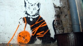 Banksy has used cats before in his street art. Is that a clue?