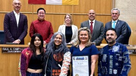 Claudia Rodríguez-Biezunski, founder of Sew Loka, stands in San Diego City Hall with her family and council member Vivian Moreno for the official proclamation of Sew Loka Day in this undated photo.
