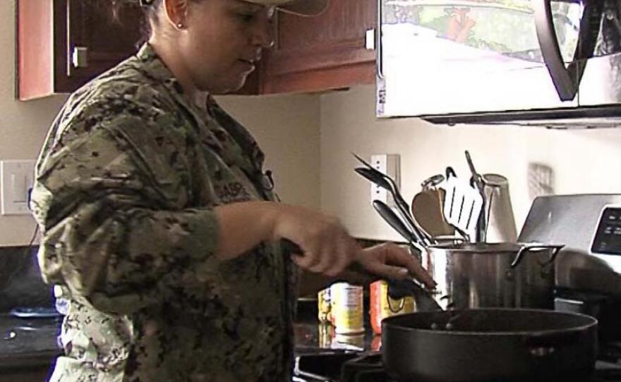 Navy Chief Petty Officer Angelina Gabriel is seen cooking in her kitchen in this undated photo.