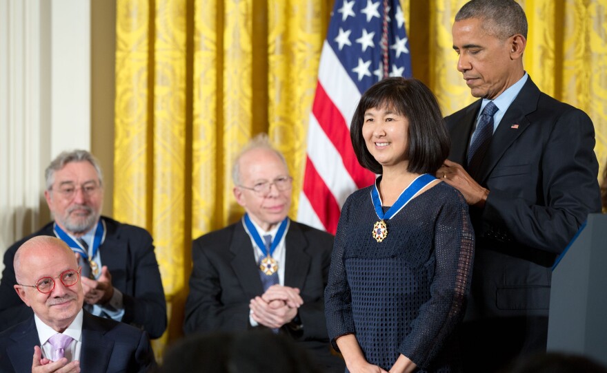 President Barack Obama presents the Presidential Medal of Freedom to Maya Lin during a ceremony in the East Room of the White House, Nov. 22, 2016.