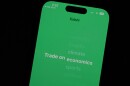 FILE - The prediction market app Kalshi is displayed on a mobile phone, April 16, 2026, in Chicago. (AP Photo/Erin Hooley, File)