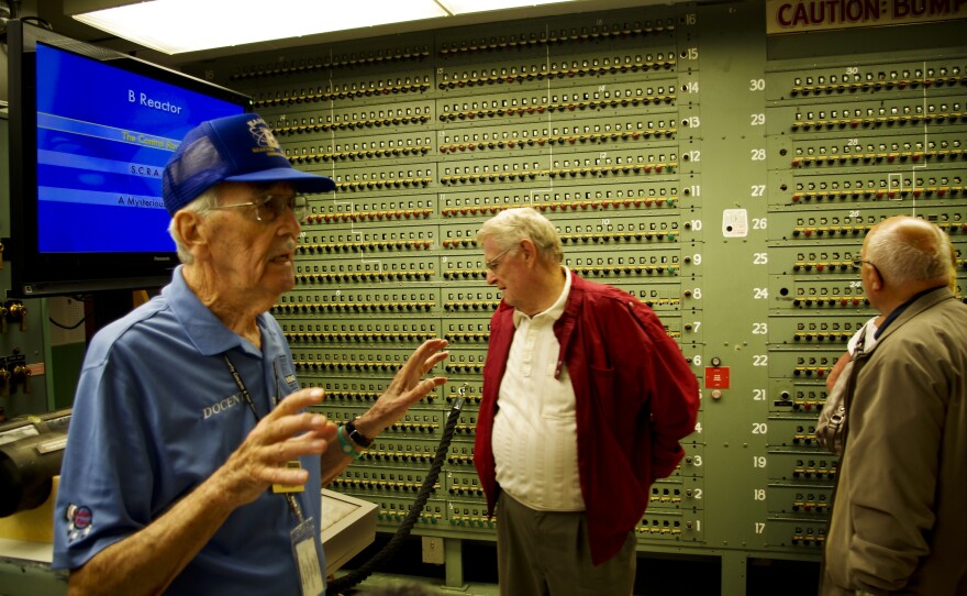 Tour guide Paul Vinther (left) began working at the B Reactor in 1950 and spent 38 years at this and other plutonium-production facilities that sprang up nearby during the Cold War. He also managed the B Reactor when it was shut down in 1968.