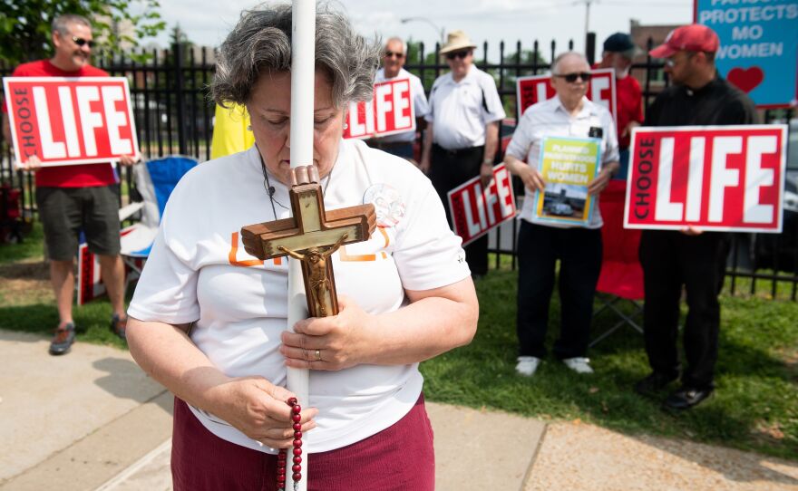 Anti-abortion demonstrators hold a protest on May 31 outside the Planned Parenthood Reproductive Health Services Center in St. Louis, the last location in the state that performs abortions.
