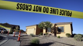 Police tape blocks off the home of Stephen Craig Paddock on Monday, Oct. 2, 2017, in Mesquite, Nev. 