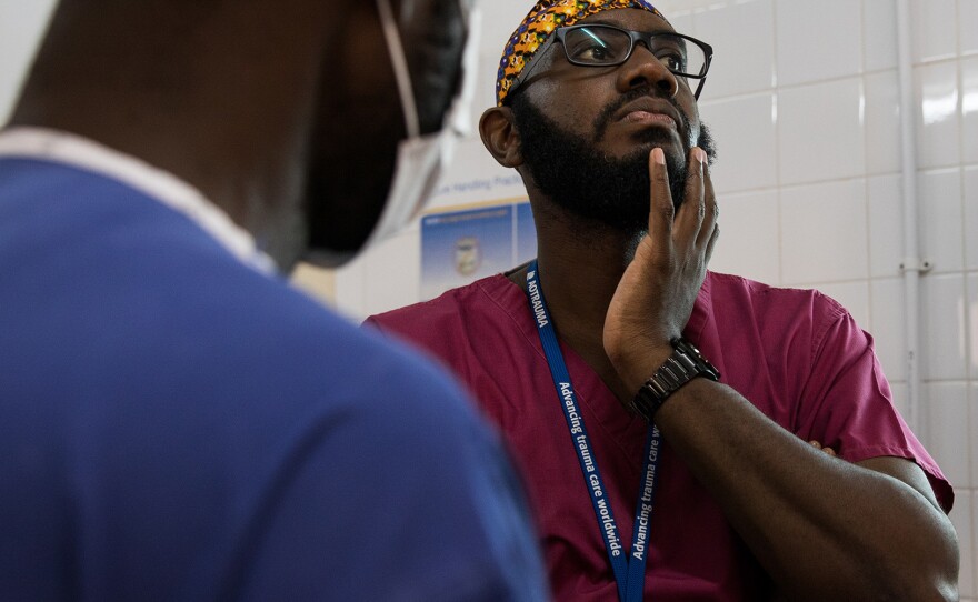 Orthopedic surgeon Kebba Marenah and his team get ready to perform knee surgery on a 14-year-old at the Edward Francis Small Teaching Hospital in Banjul, the capital of Gambia. The country struggles with a lack of access to sufficient pain medications.