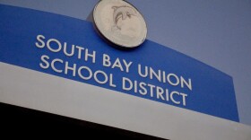 A sign for South Bay Union School District is shown at dusk, Dec. 8, 2025.