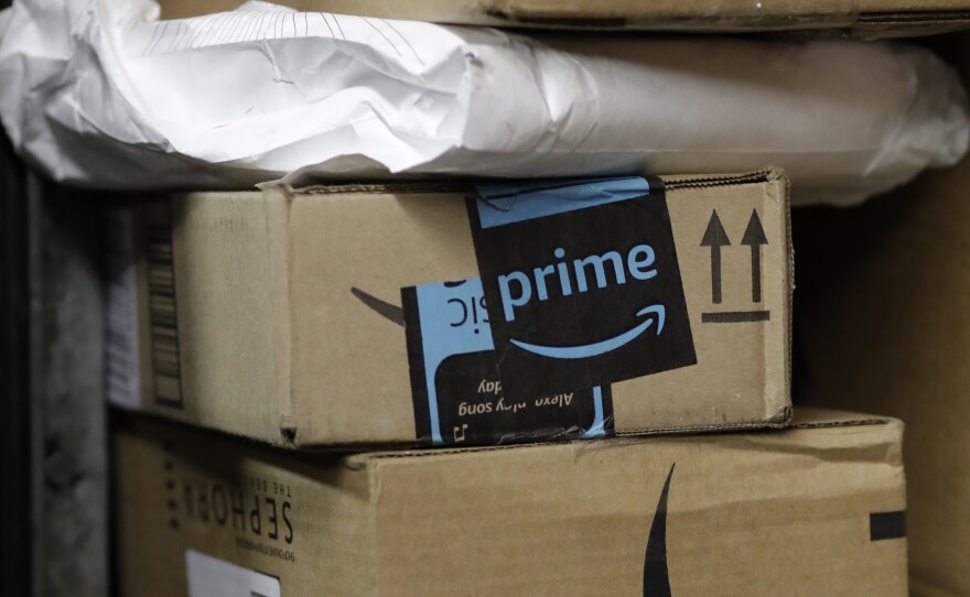 A package from Amazon Prime is loaded for delivery on a UPS truck in New York, May 2017.