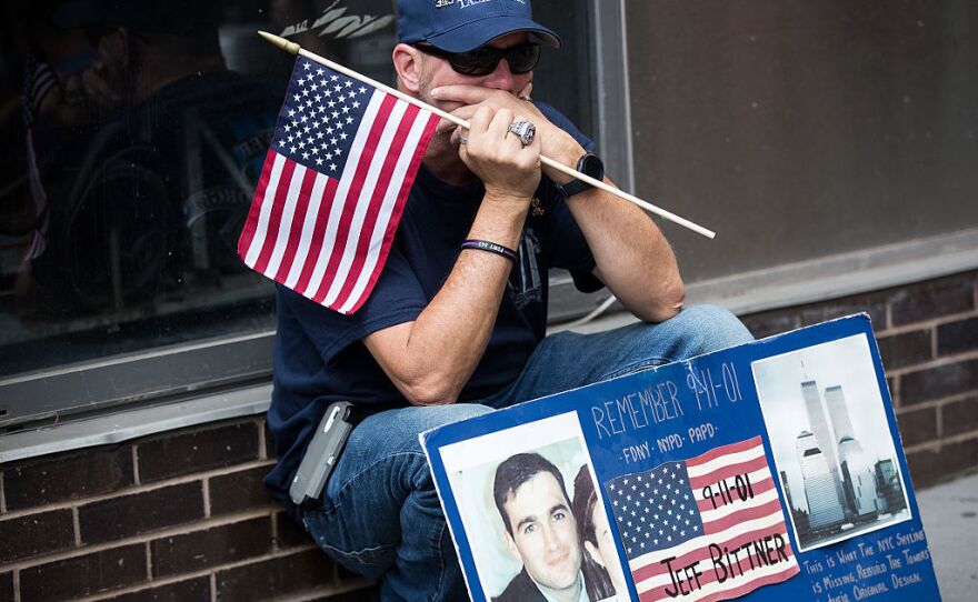 A man pauses near the Sept. 11 Memorial site in New York City.
