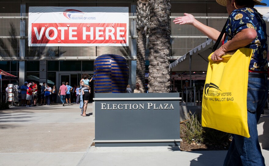 San Diego County residents are shown outside the Registrar of Voters Office in Kearny Mesa on Nov. 5, 2018.