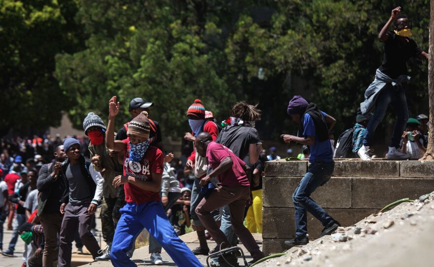 Amid growing tension over tuition fees, violent clashes with police have erupted regularly on campuses across South Africa in recent months, and several universities have been closed to avoid further unrest. At Wits University on Monday, protesters throwing rocks were dispersed by riot police using tear gas, rubber bullets and stun grenades.