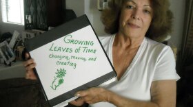 Mary Marin holds a scrapbook of photos from her childhood in a South Phoenix barrio. Her father was an illegal immigrant and was threatened with deportation in the 1940s. Still, Marin favors Arizona's tough new law against illegal immigration.