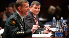 Commander of the International Security Assistance Force and Commander of U.S. Forces Afghanistan Gen. Stanley McChrystal (L) and U.S. Ambassador to Afghanistan Karl Eikenberry (R) testify during a hearing before the House Armed Services Committee December 8, 2009 on Capitol Hill in Washington, DC.