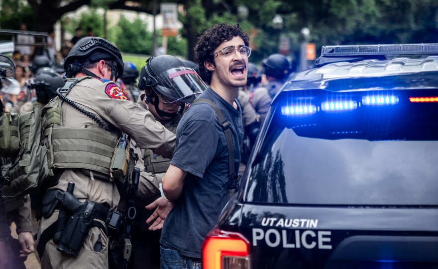 Law enforcement arrest students taking part in a pro-Palestinian walkout and protest on April 24, 2024, at the University of Texas at Austin.