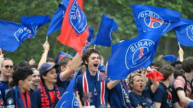 PSG fans celebrate the day after winning the Champions League title, at the Eiffel Tower, in Paris, Sunday, May 31, 2026.