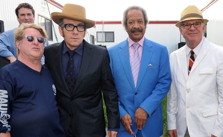 From left: Quint Davis, Elvis Costello, Allen Toussaint and Steve Martin, photographed backstage at the 2010 New Orleans Jazz & Heritage Festival.