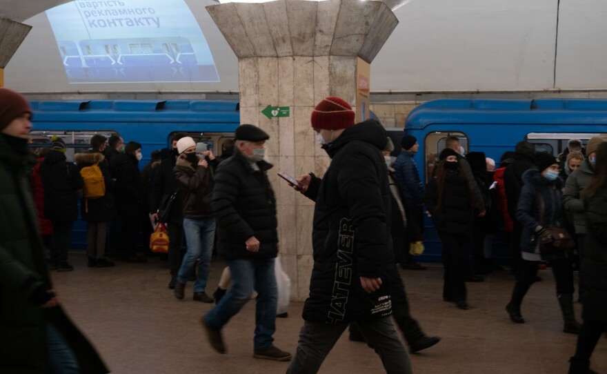 People going about their days in the metro in Kyiv, on Jan. 26.