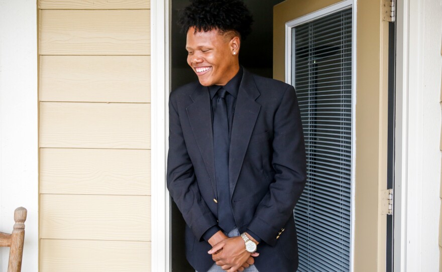 Terrence Johnson, a junior at the University of Mississippi, poses for a portrait outside his apartment in Oxford, Miss.
