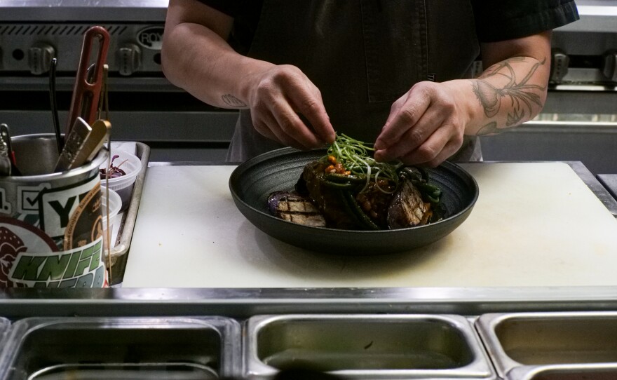 Tara Monsod, executive chef of Animae, plates a dish. San Diego, Calif. April 11, 2024.