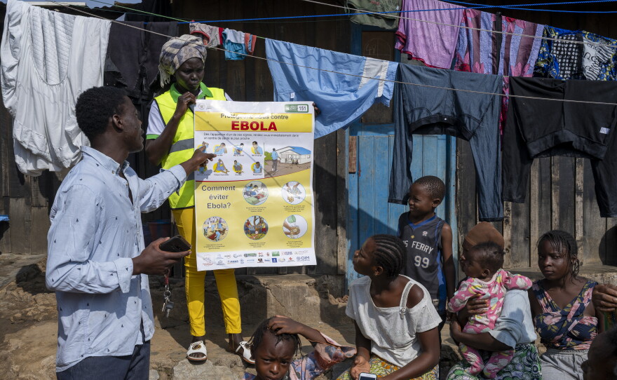 Eliezer Kasongo, president of REMEDE Bunia, raises awareness among residents about Ebola prevention measures during a community outreach event on Ebola Awareness Day in Bunia, Ituri Province, Democratic Republic of the Congo.