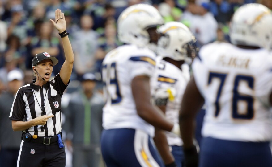 Sarah Johnson makes a call during a preseason football game. Our story about Johnson becoming the NFL's first full-time female game official was one of the Two-Way's most-shared posts of 2015.