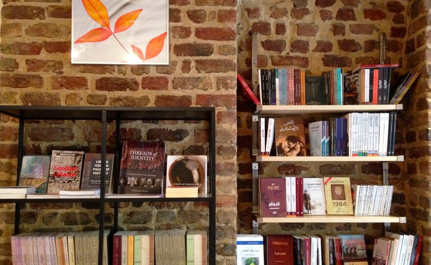 Arabic- and English-language books are displayed in the new Syrian-run Pages bookstore in Istanbul. Titles in Turkish and French are also available.