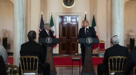 President Donald Trump listens as Mexican President Andres Manuel Lopez Obrador delivers a statement before a dinner at the White House, Wednesday, July 8, 2020, in Washington. 

