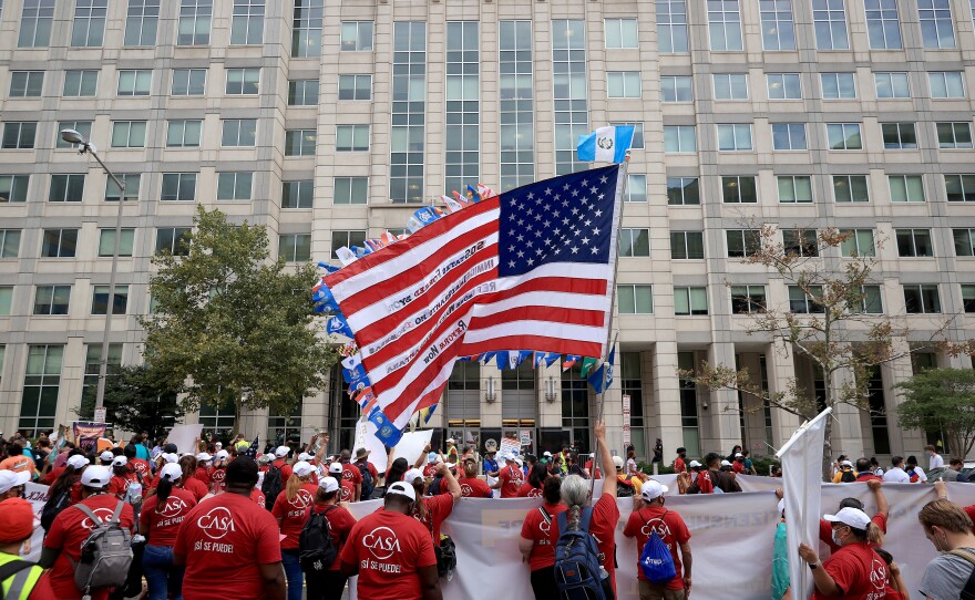Thousands of demonstrators rally in the street outside Immigration and Customs Enforcement headquarters while demanding a pathway to citizenship for the more than 11 million undocumented immigrants living in the United States on September 21, 2021 in Washington, DC.