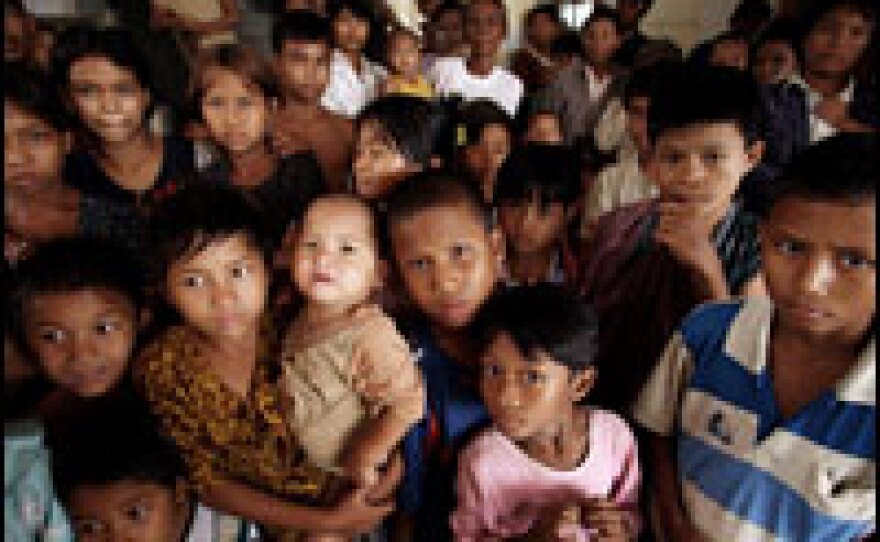 Desperately awaiting supplies in Myanmar, where the ruling junta continues to bar entry to relief workers and journalists alike.