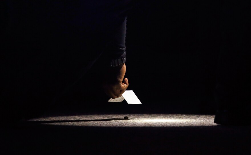Police place a marker along East San Bernardino Avenue where a shootout occurred Wednesday.