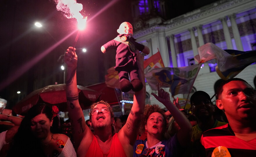 Supporters of President Luiz Inacio Lula da Silva celebrate after he wins a fourth term in the presidential runoff in Rio de Janeiro, Brazil, Sunday, Oct. 25, 2026.