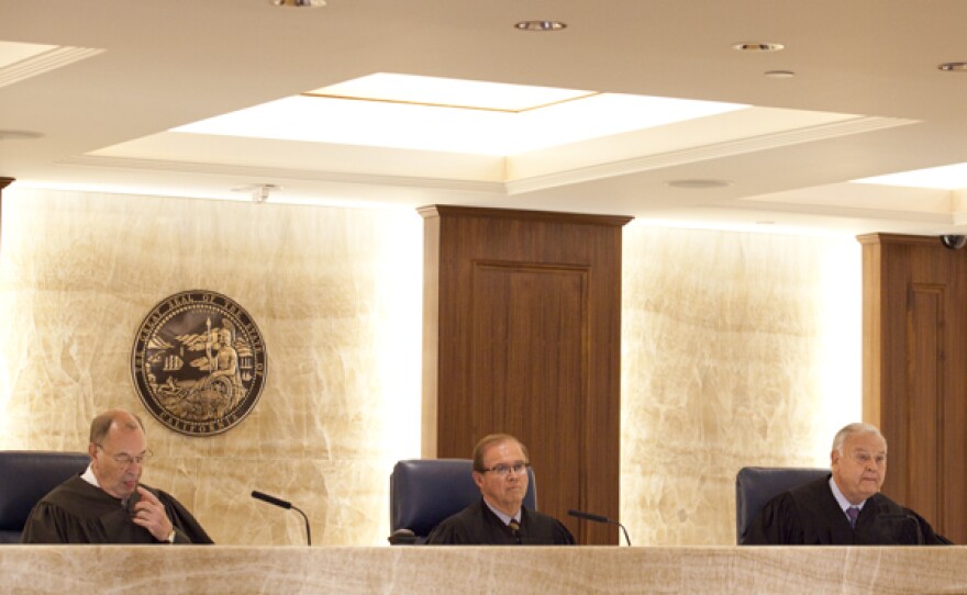 State appeals court Justices Alex McDonald, Gilbert Nares and James McIntyre (shown from left to right) listen to oral arguments in a case brought by inewsource against the North County Transit District over the release of agency documents, April 12, 2015.