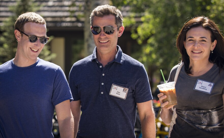 Facebook's CEO Mark Zuckerberg, Vice President of Partnerships Dan Rose and Chief Operating Officer Sheryl Sandberg walk together at the Allen & Company Sun Valley Conference on July 12, 2018 in Sun Valley, Idaho. Top tech and media moguls descend on the resort every year for a week of activities - and deals.
