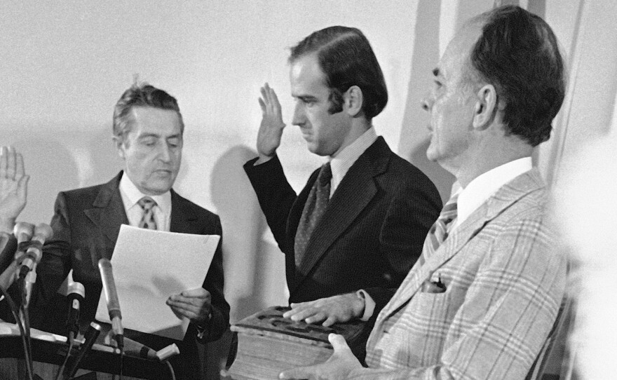 Joe Biden takes the oath of office in 1973 for the U.S. Senate in his sons' hospital room following a car crash that killed his wife and daughter. In the foreground, is his then-4-year-old son Beau.