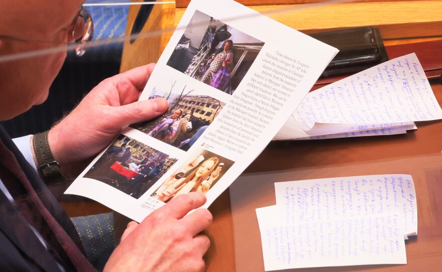 Ambassador Vassily Nebenzia, permanent representative of the Russian Federation, holds documents during a U.N. Security Council meeting discussing the Russian and Ukraine conflict on March 11. The U.N. Security Council met at Russia's request to discuss Russia's claim of U.S.-supported chemical and biological weapons labs in Ukraine.