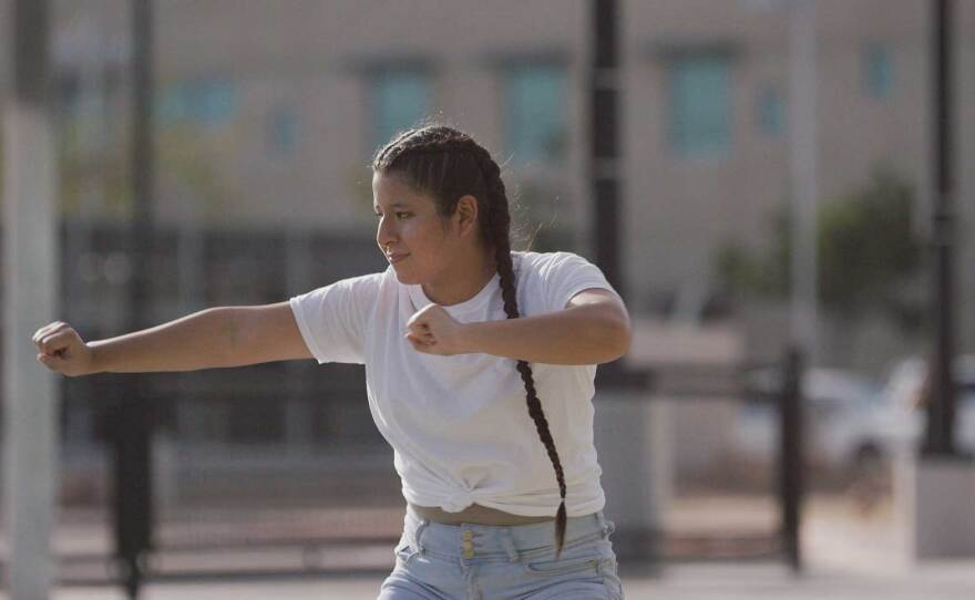 A dancer from TranscenDANCE performs original choreography in a park for the "Home Within A Home" film production, streaming Dec. 5 and 6, 2020.