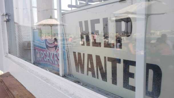 A help wanted sign at the Tin Fish restaurant on Imperial Beach Pier, Sept. 12, 2020.