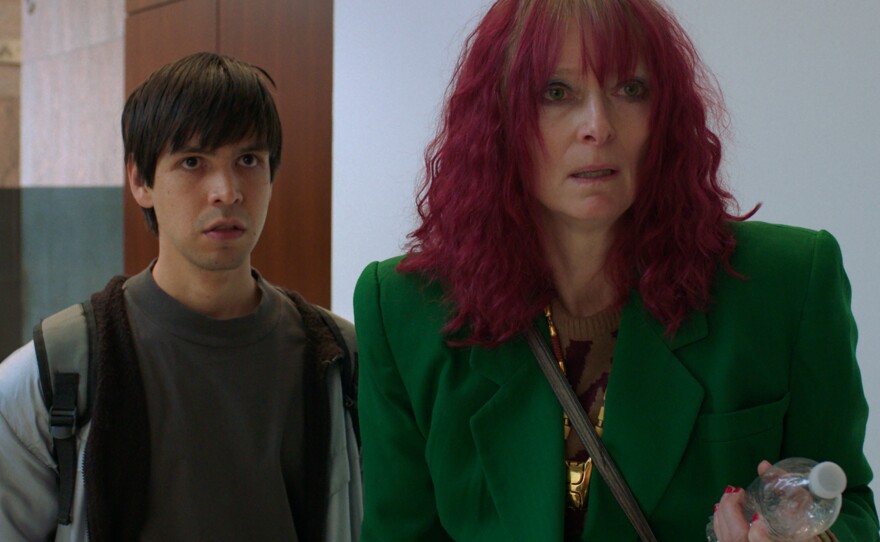 Julio Torres as Alejandro and Tilda Swinton as Elizabeth in <em>Problemista</em>.