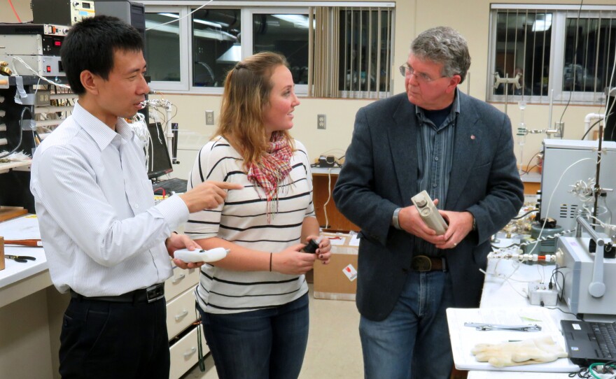 Research professor Wenjie Liu works with graduate student Jennifer Tufariello and professor Herb Hill to develop a marijuana breathalyzer at Washington State University.