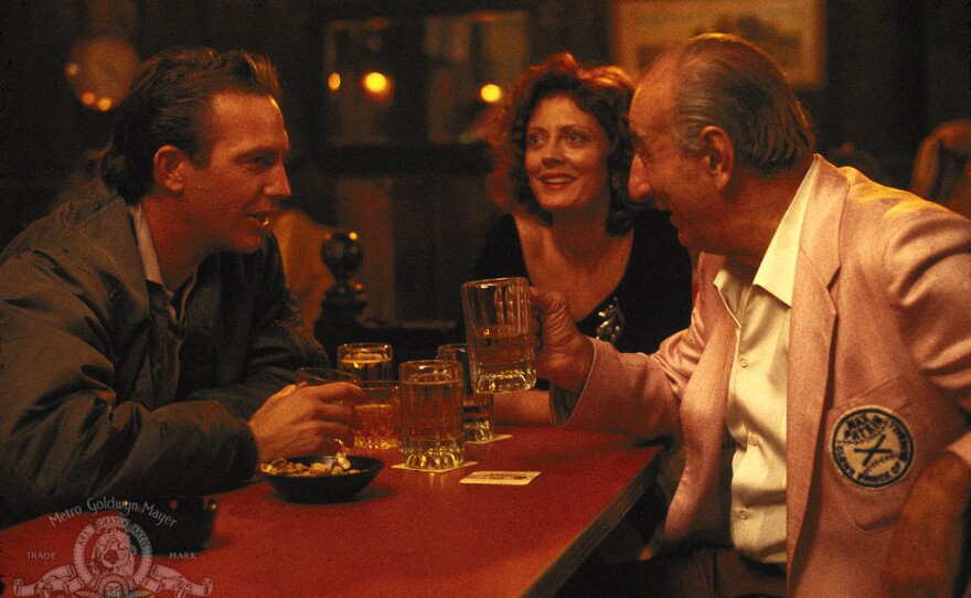 Kevin Costner, Susan Sarandon and Max Patkin in "Bull Durham."