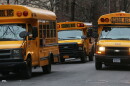 School buses idle in front of a school in Manhattan's East Village on Jan. 15, 2013.