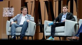 Elon Musk and Sam Altman speak at the Vanity Fair New Establishment Summit at Yerba Buena Center for the Arts on October 6, 2015 in San Francisco, California.