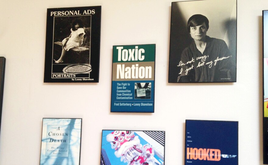 Copies of the covers of Shavelson's books decorate his office wall.