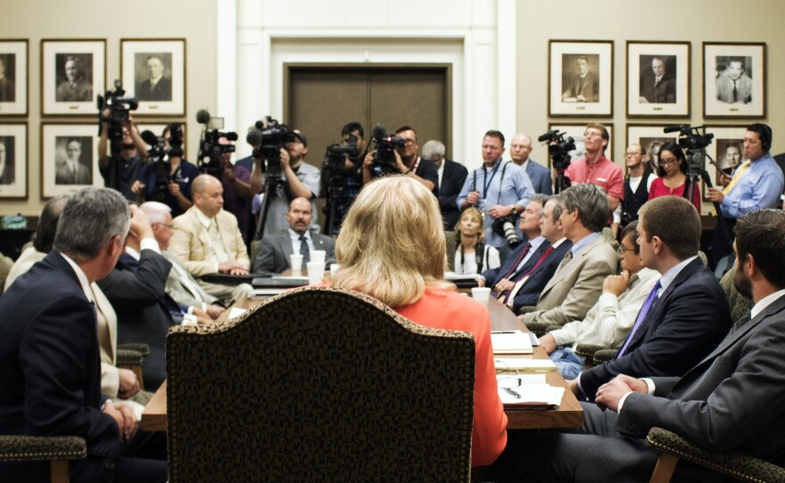 Oklahoma Gov. Mary Fallin answers media questions at the state Capitol in August after meeting with a council she formed to organize state resources related to the surge of earthquakes.