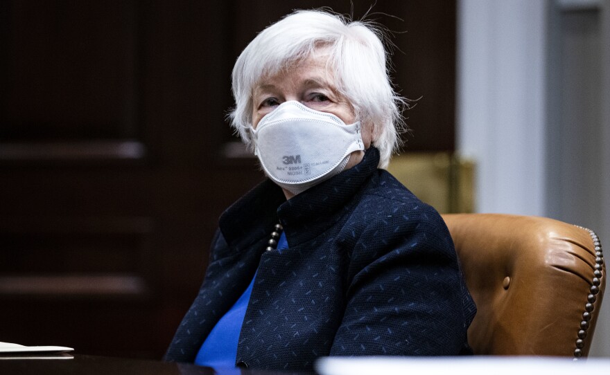 Treasury Secretary Janet Yellen listens during a meeting with President Biden in the White House on March 5. Yellen on Monday proposed a minimum global tax rate for corporations.